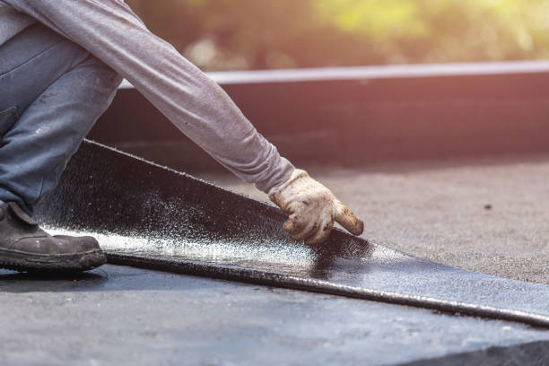 Professional Waterproofing technician working in Kewaskum, WI